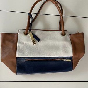 VINCE CAMUTO NAVY, WHITE, AND TAN POCKETBOOK